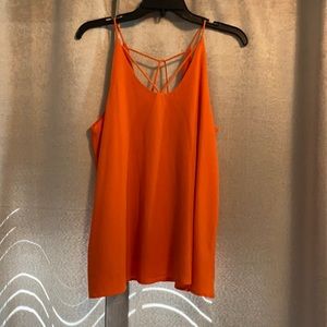 Tank with fun back. Worn once